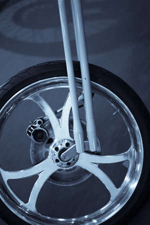 Color close up of a motorcycle wheel.の写真素材