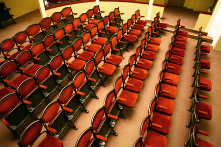 Color image of vintage seats in a theater.