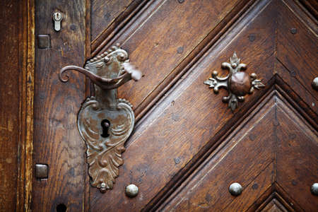 Color image of a very old door knob.