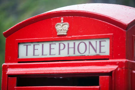 Color image of a vintage red London telephone booth.の写真素材
