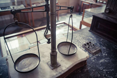 Color image of a vintage balance in a room.の写真素材