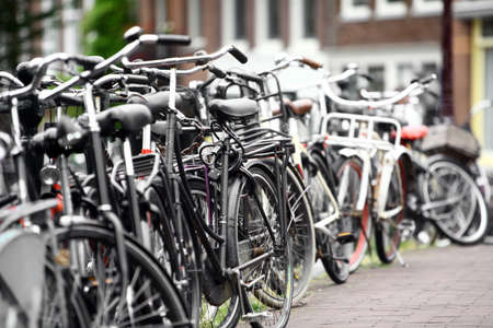 Color image of a large group of parked bicycles.の写真素材