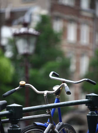 Color image of some parked bicycles on a bridge.の写真素材