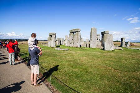 July 22, 2015 -  Stonehenge, Uk: People gather around the historical monument Stonehenge in England, UK.のeditorial素材