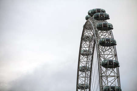 July 20, 2015 - London, UK: Color image of the Eye of London, against a cloudy sky, in London, UK.のeditorial素材