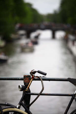 Color image of a parked bicycle on a bridge.の写真素材