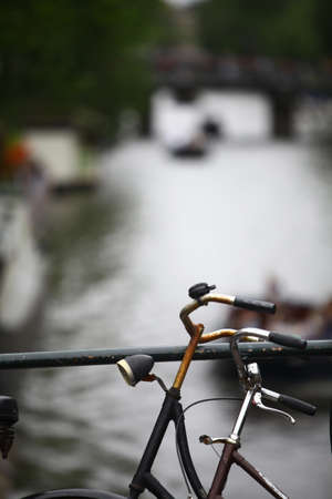 Color image of some parked bicycles on a bridge.の写真素材