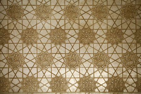 Close up shot of some Arabic decorations at the Alhambra palace in Granada, Spain.の写真素材
