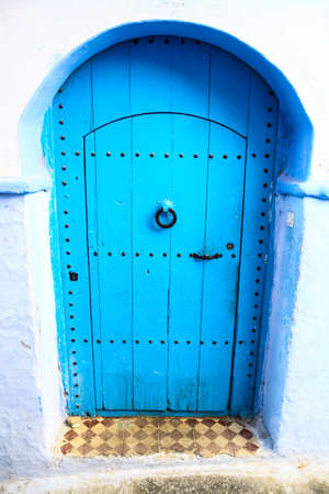 Color image of door in the famous blue town Chefchaouen, Morocco.の写真素材