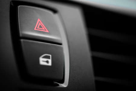 Detail of a warning button in a car.の写真素材