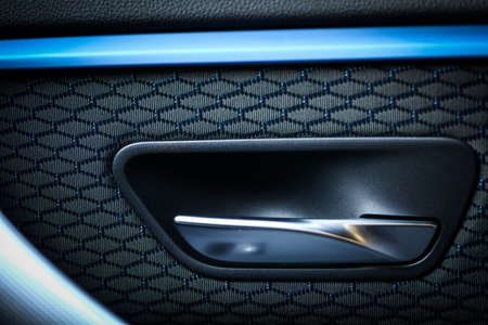 Detail of a door opener from inside of a car.の写真素材