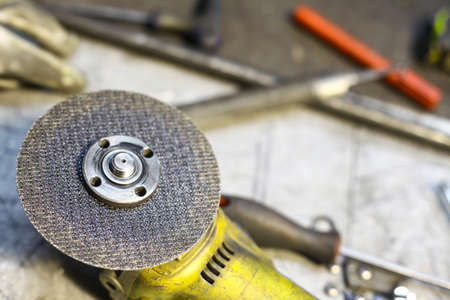 Color image of a grinder in a workshop.