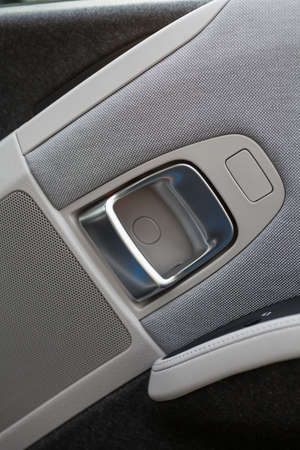 Detail of a door opener from inside of a car.