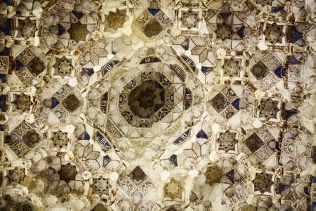 Close up shot of some Arabic decorations on a wall.の写真素材