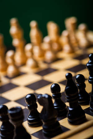 Close-up image of a chess board with chess pieces.の写真素材