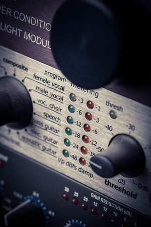 Color image of many buttons in a sound recording studio.