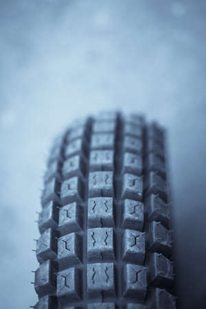 Color image of an off-road trial motorcycle tire.