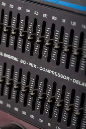 Color image of many buttons in a sound recording studio.