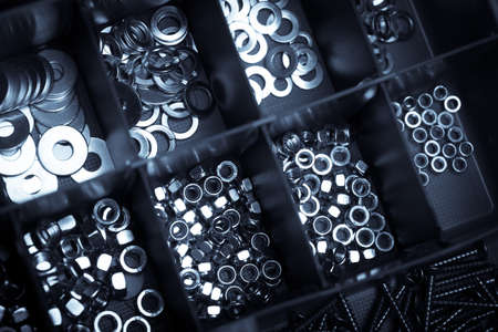Some bolts, nuts and washers in a box.