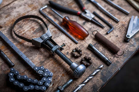 Color image of many tools on a wooden plank.の写真素材