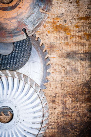 Color image of some cutting disks on a wooden plank.の写真素材