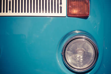 Color detail on the headlight of a vintage car.の写真素材