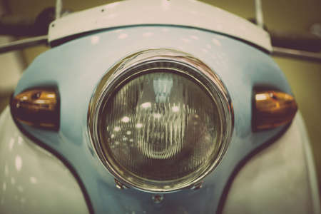Color detail image of the headlight of a vintage motorcycle.の写真素材