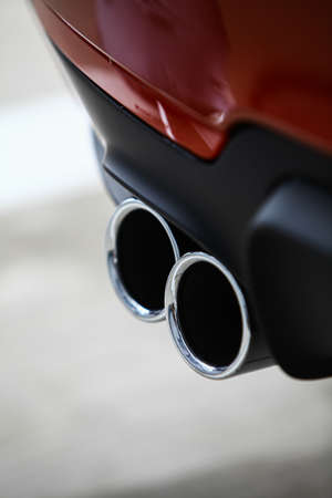 Detail of the double exhaust of a carの写真素材