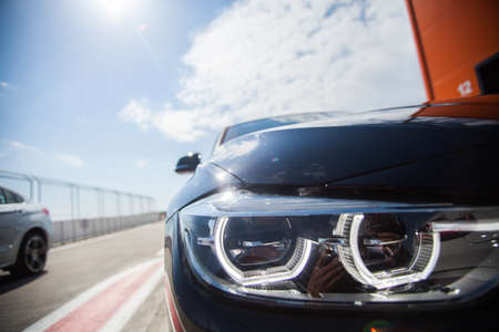 Detail on one of the LED headlights of a car.