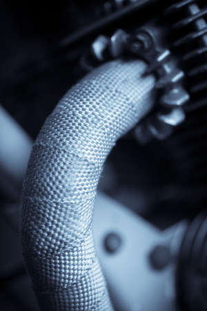 Detail of a motorcycle exhaust pipes and cylinders.の写真素材