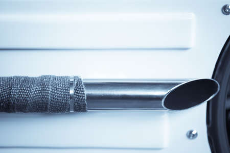 Detail of a motorcycle exhaust pipes and cylinders.の写真素材