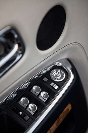 Close up shot of window switches of a luxury car.の写真素材