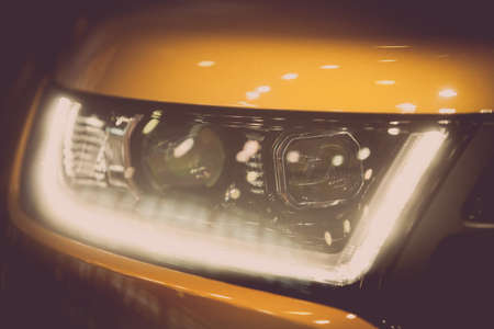 Close up shot of a car's LED headlight.の写真素材