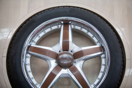 Close up shot of a new wooden car rim.