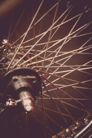 Close up shot of a motorcycle wheel, with spokes.の写真素材