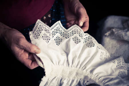 Close up shot of a traditional hand made shirt, in Maramures, Romania.の写真素材