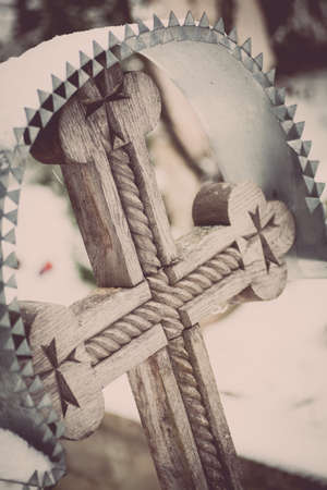 Close up shot of a wooden cross in a cemetery.の写真素材
