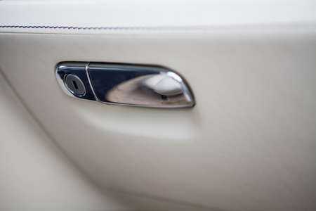 Color detail of the glove compartment in a luxury car.の写真素材