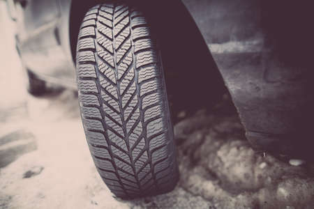 Close up shot of a car's winter tire.の写真素材