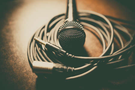 Close up shot of a microphone and some cables.の写真素材