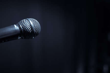 Close up shot of a microphone on a stand.の写真素材