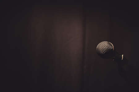 Close up shot of a microphone on a stand.の写真素材