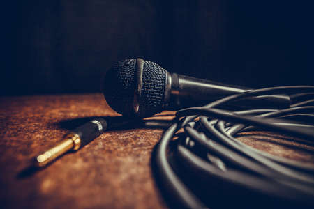 Close up shot of a microphone and some cables.の写真素材