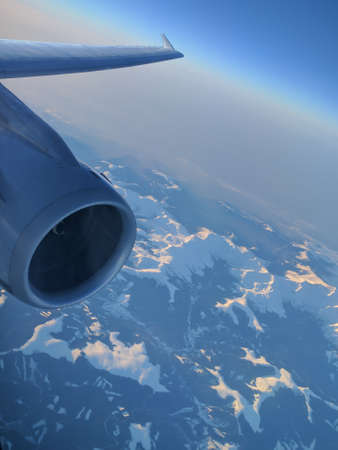 Color image of a plane engine, in flight.