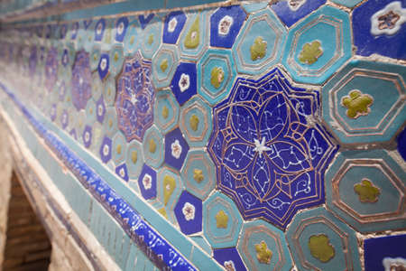 Colored arabic decorations close up on a wall.の写真素材