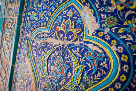 Close up shot of some Arabic decorations on a wall.の写真素材