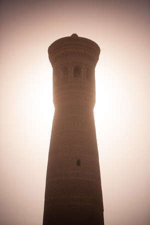 Color image with some madrasa tower in Khiva, Uzbekistan.の写真素材