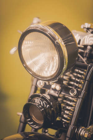 Color image of a vintage motorcycle headlight.の写真素材