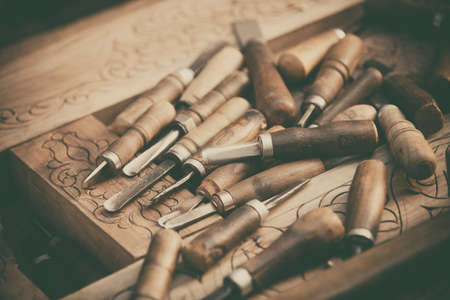 Close-up shot of some wood engraving tools.の写真素材