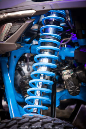 Color image of a new ATV shock absorbers.